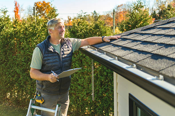 Professional Storm Damage Roof Repair technician working in Memphis, NY